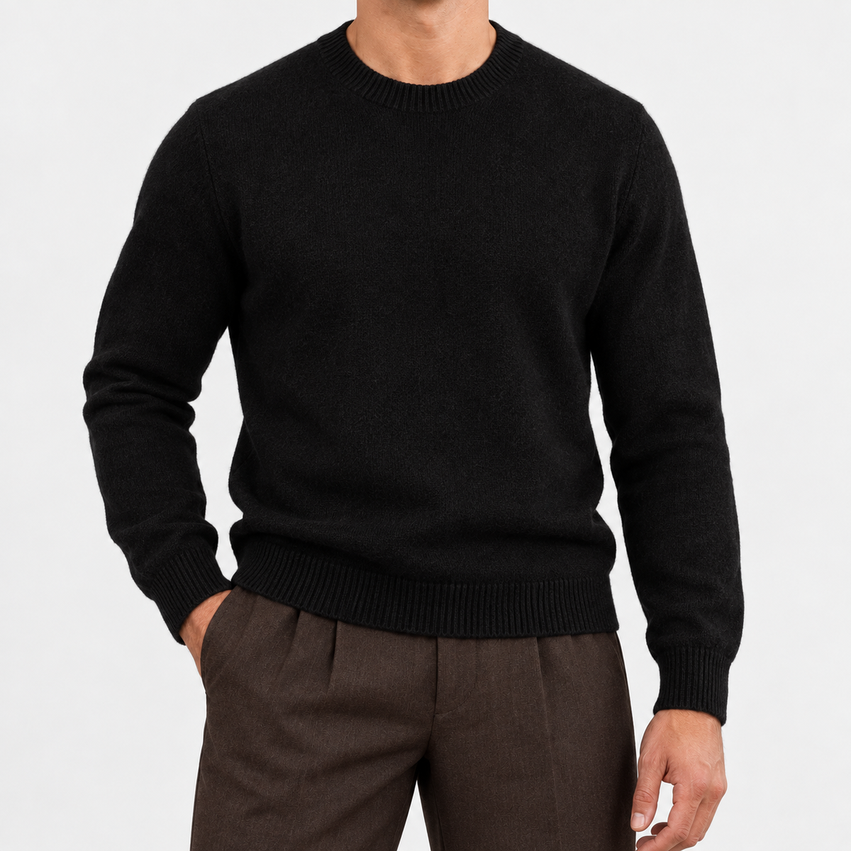 Fine knit wool crew neck sweater in black, front view on a model
