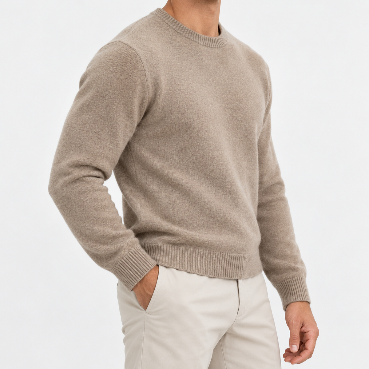 Fine knit wool crew neck sweater in taupe, side view on a model