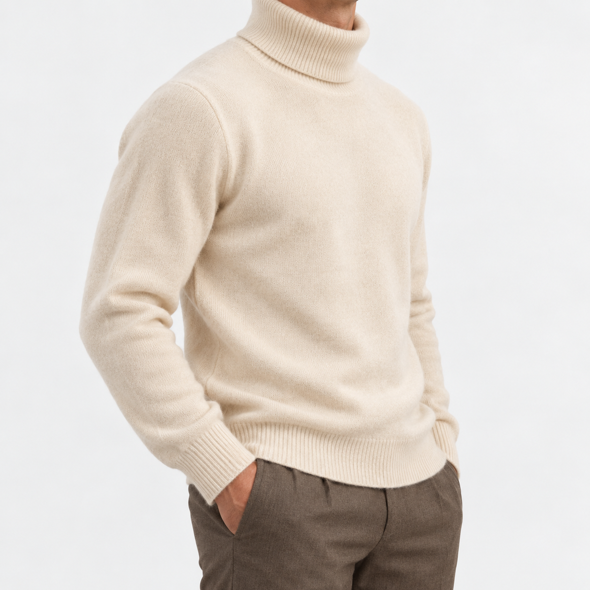 Fine knit wool turtleneck sweater in cream, side view on a model