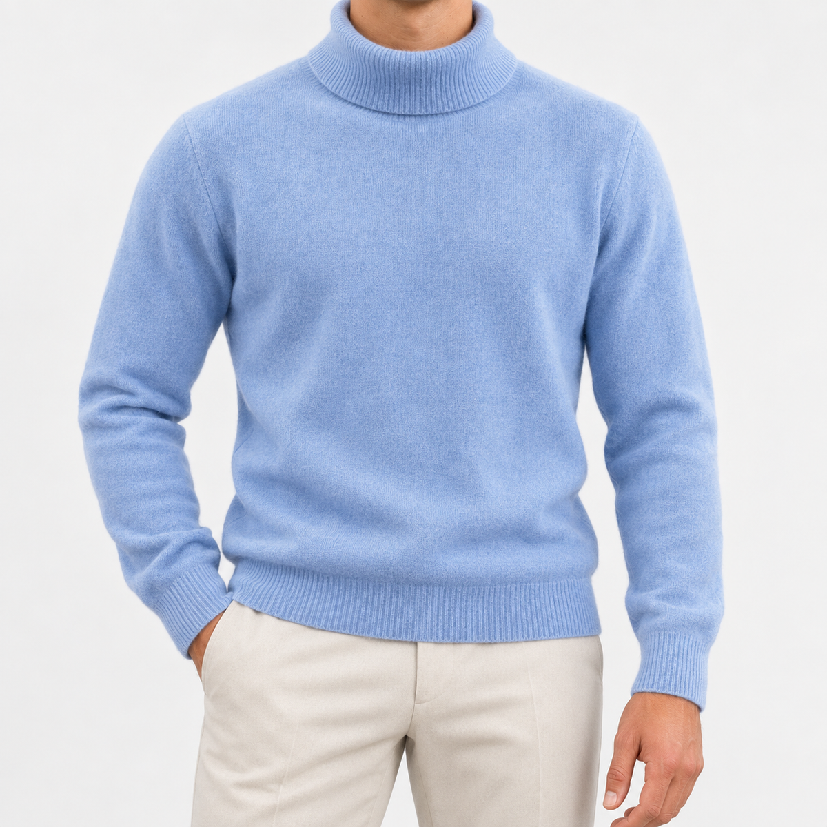 Fine knit wool turtleneck sweater in mist blue, front view on a model