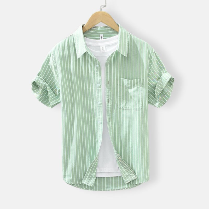 Antonios Green Striped Summer Shirt hanging on a hanger with a white undershirt.