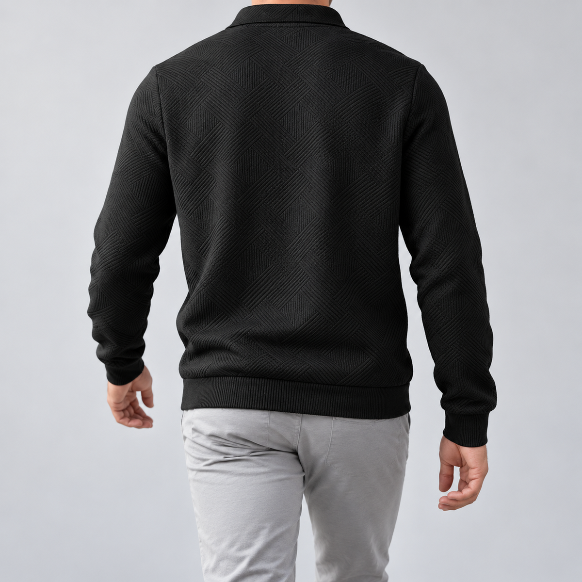 Leo zip sweater in black, back view on a model