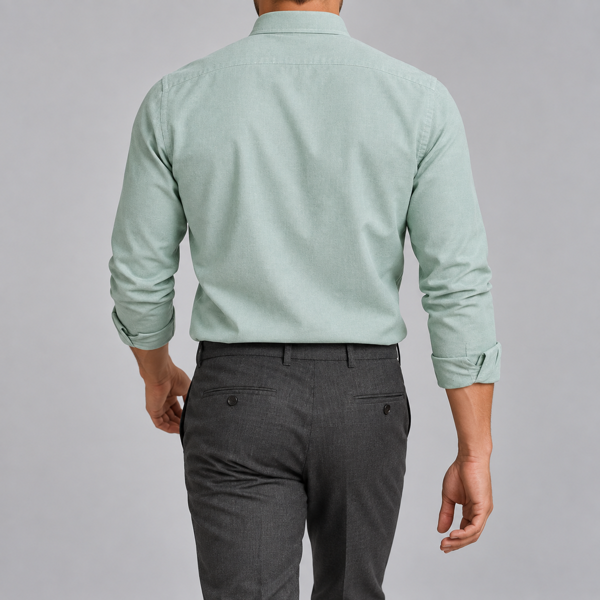 Ramon button-down shirt in green sage, back view on a model