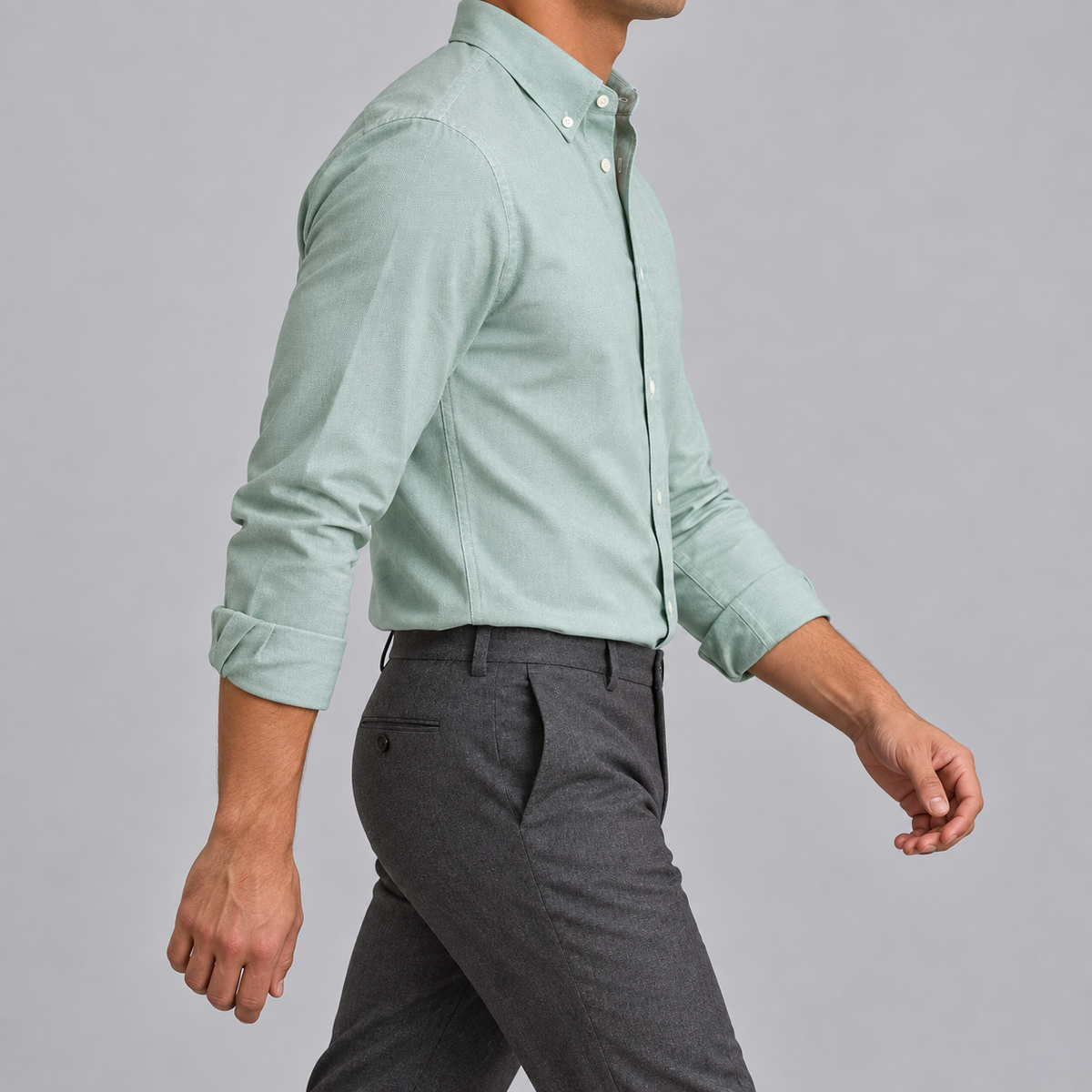 Ramon button-down shirt in green sage, side view on a model