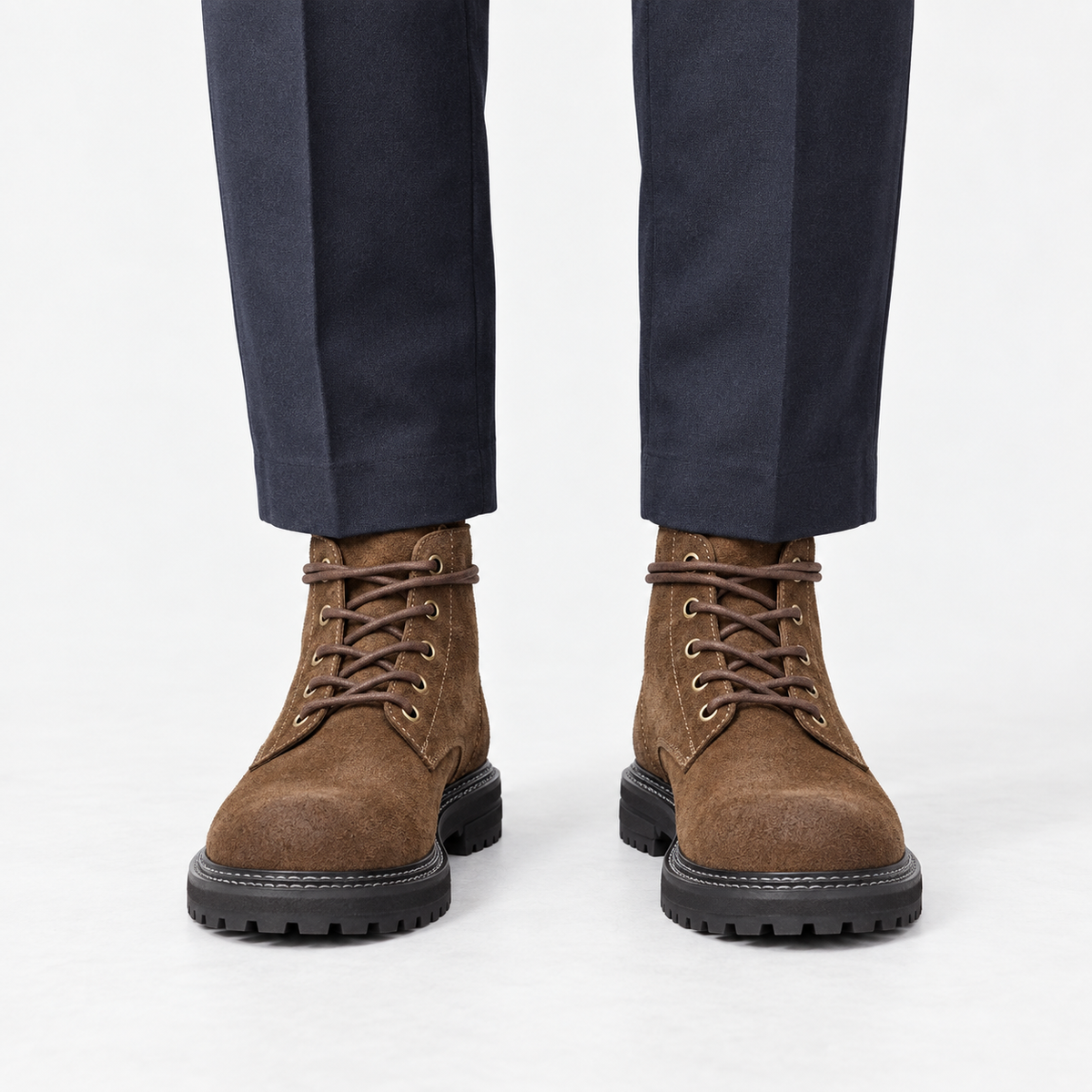 Rough suede lace up ankle boots in brown standard, front view on a model