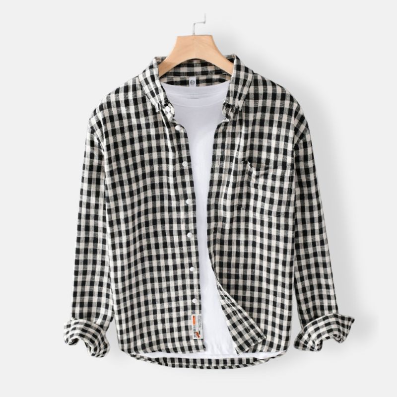 Antonios Casual Plaid Shirt in black and white checkered pattern, 100% cotton, button-down collar, front chest pocket, hanging on hanger.