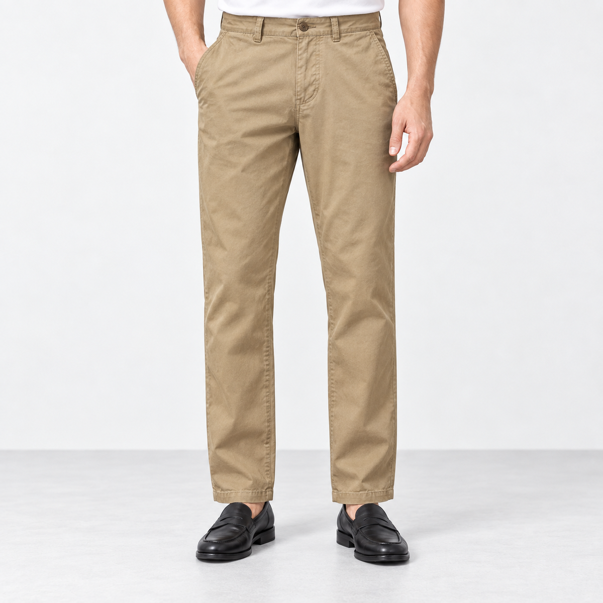 Straight leg cotton utility trousers in dark khaki, front view on a model