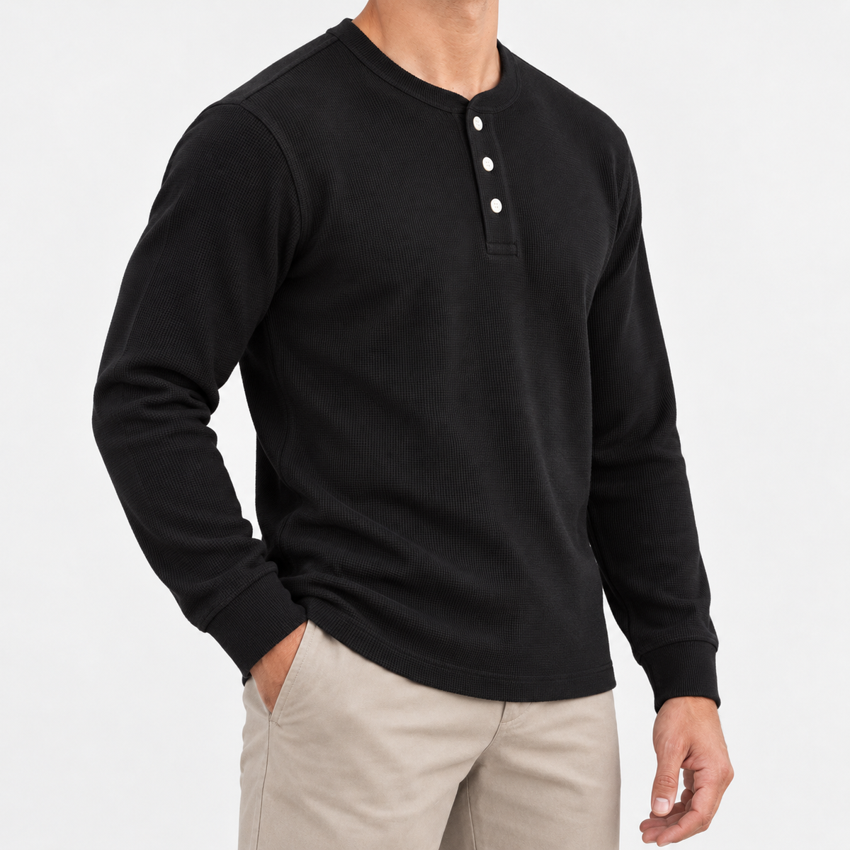 Waffle knit long sleeve henley in black, side view on a model