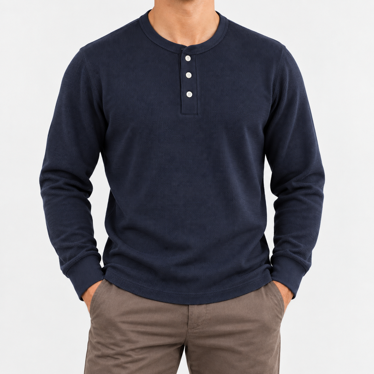 Waffle knit long sleeve henley in navy, front view on a model