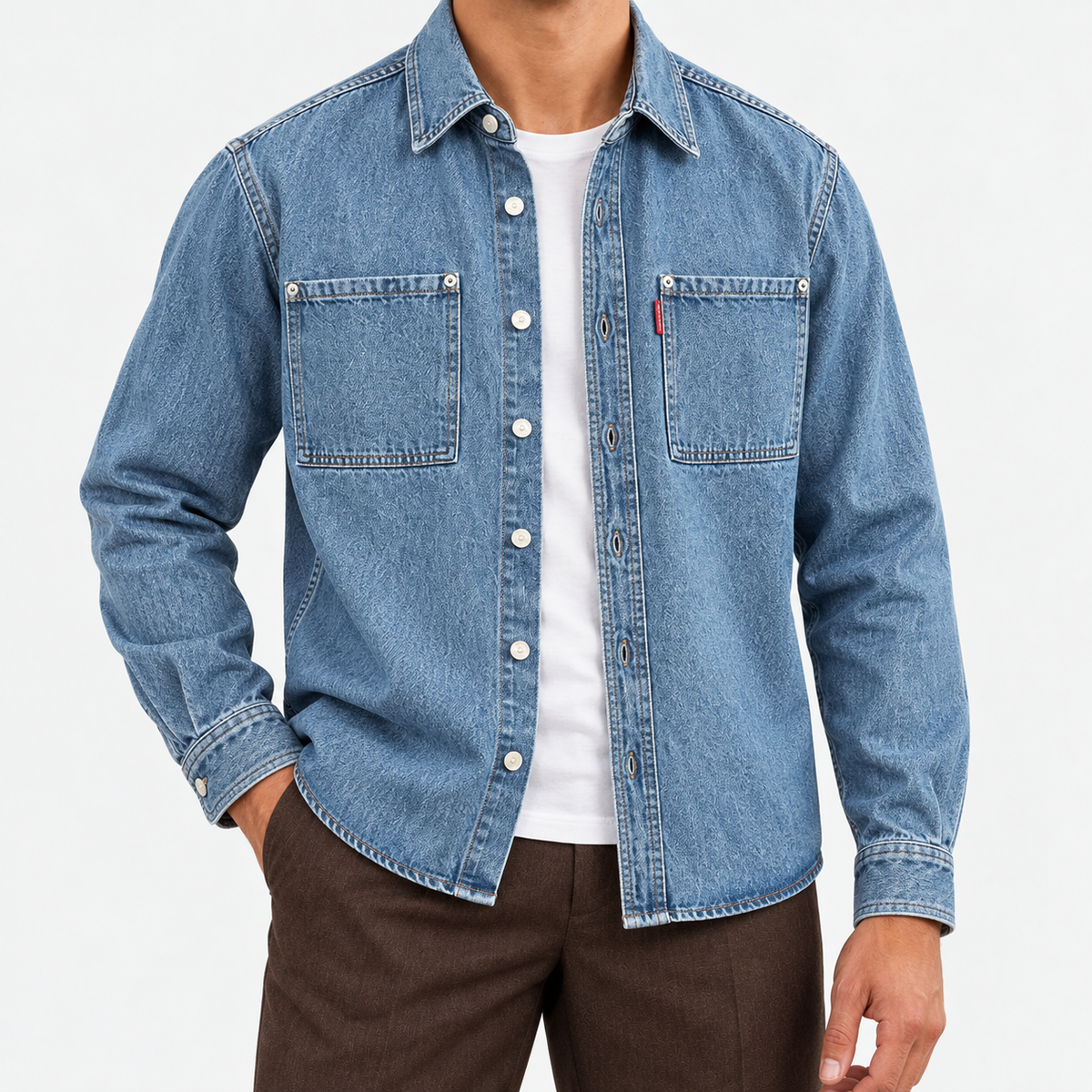 Washed denim twin pocket shirt in denim blue, front view on a model