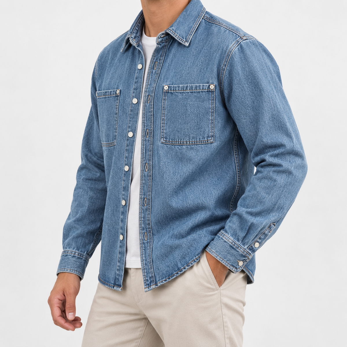 Washed denim twin pocket shirt in denim blue, side view on a model