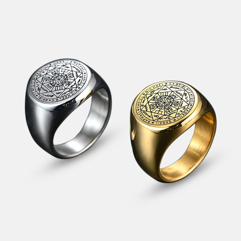 Ancient Stainless Steel Ring with intricate engraving, available in silver and gold finishes.