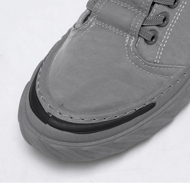 Gray canvas shoe detail from AntoniosClothing Canvas Autumn Shoes, featuring durable construction and stylish stitching.