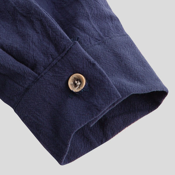Detailed cuff of AntoniosClothing Casual Long-Sleeve Shirt for men in navy blue fabric.