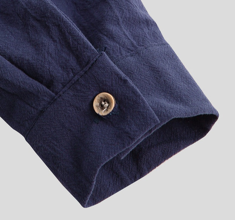 Detailed cuff of AntoniosClothing Casual Long-Sleeve Shirt for men in navy blue fabric.