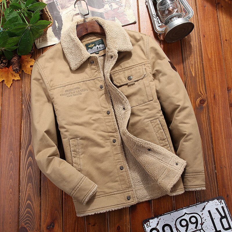 Antonios Cotton Fleece Winter Jacket in khaki displayed on a wooden surface with foliage accents.