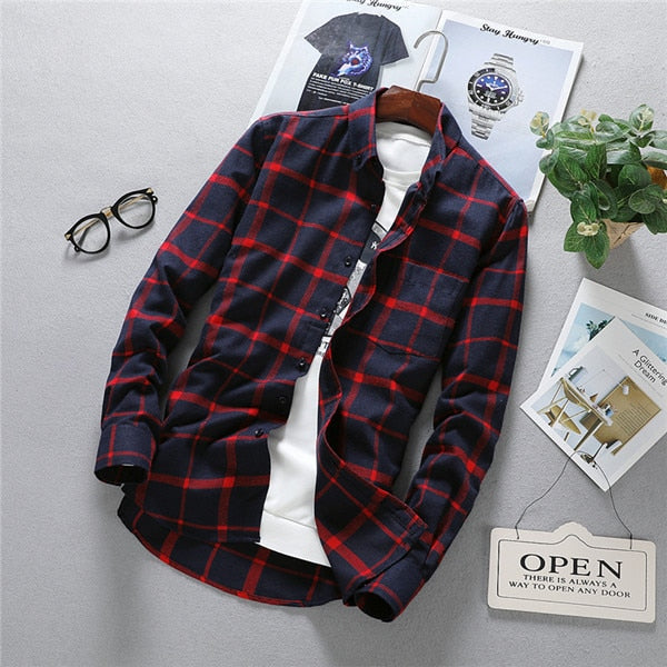 Antonios Long Sleeve Oxford Shirt for Men in plaid pattern, crafted from soft cotton, styled casually with magazines and glasses.