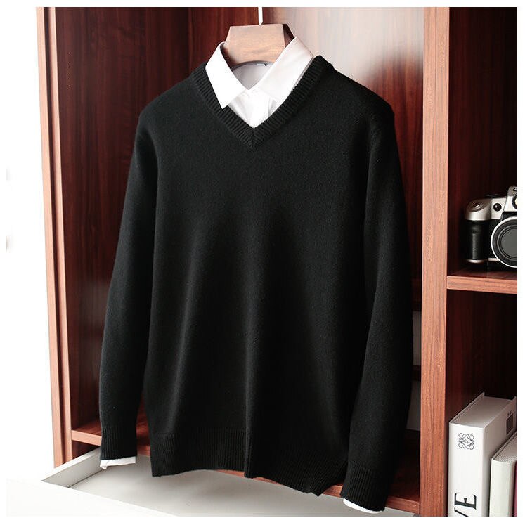 Antonios Wool Winter V-Neck Sweater Men in black, featuring a solid pattern, displayed on a hanger.