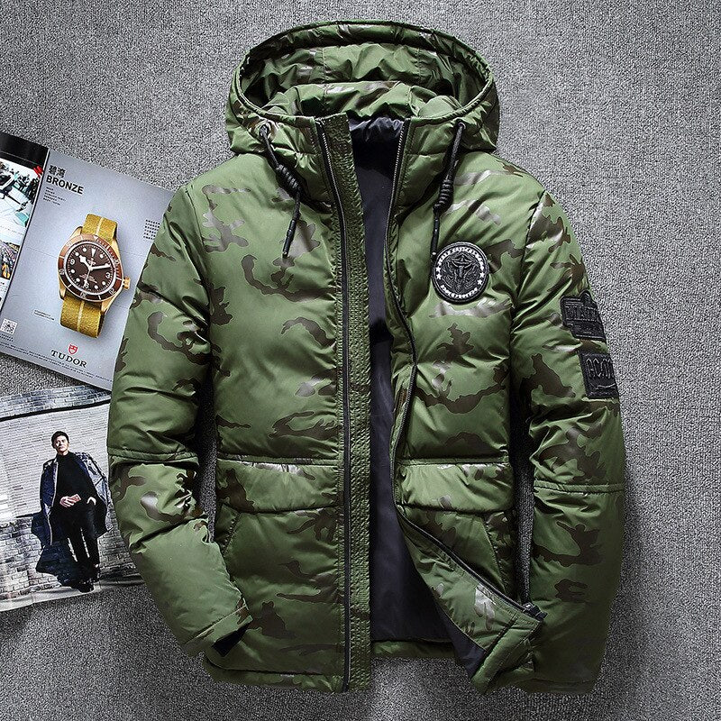 Antonios Camouflage Pattern Winter Jacket in green, featuring hood and insignia, made from cotton and polyester for warmth and style.