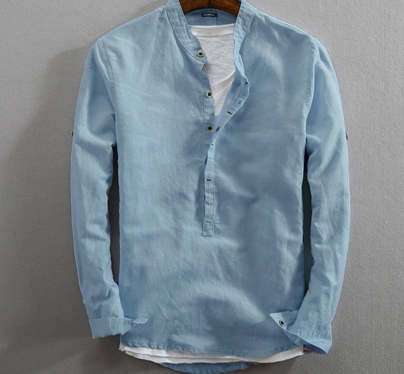 Elegant light blue long-sleeve men's shirt by AntoniosClothing, featuring organic cotton blend and classic collar.
