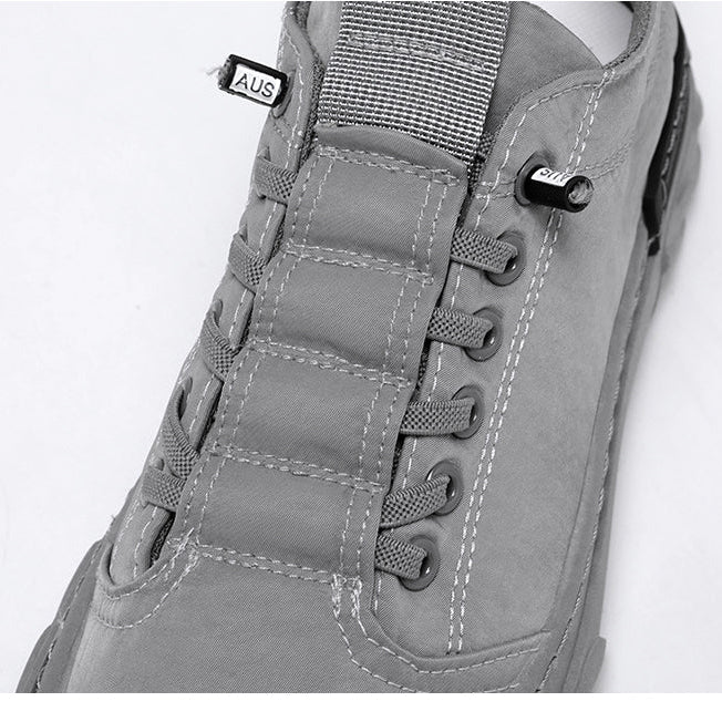 Gray AntoniosClothing Canvas Autumn Shoes with lace-up closure and detailed stitching.