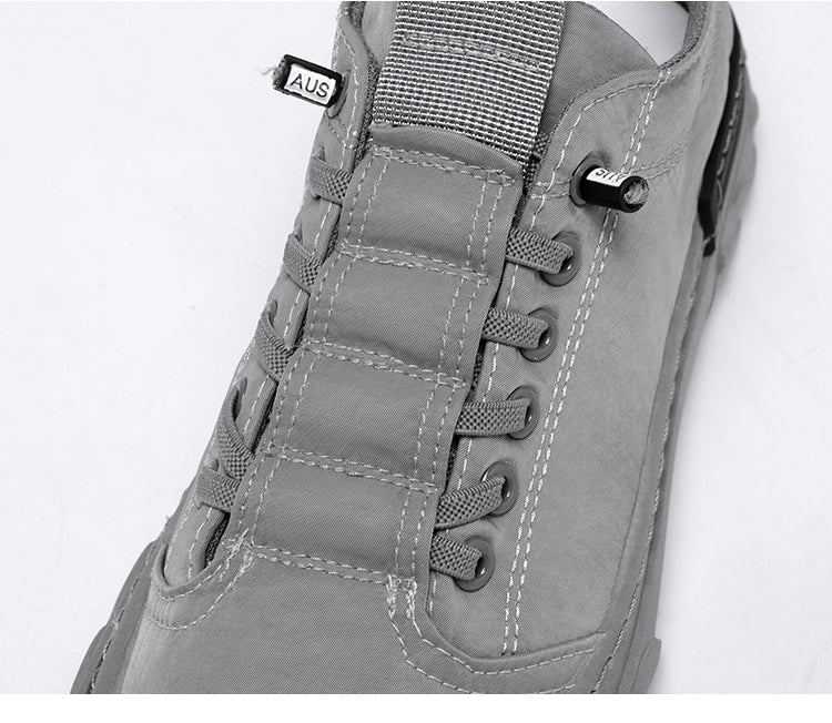 Gray AntoniosClothing Canvas Autumn Shoes with lace-up closure and detailed stitching.