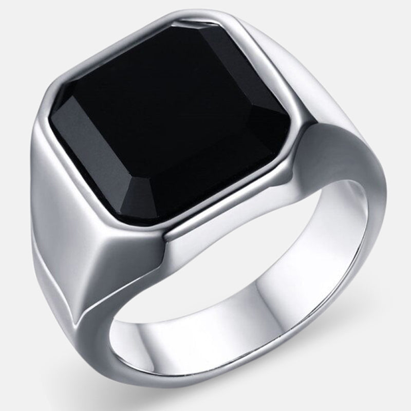 Antonios Modern Stainless Steel Ring with black gemstone and intricate design.