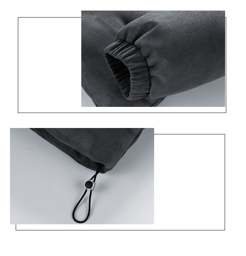 Men's dark grey faux suede puffer jacket detail with elastic cuff and drawstring.