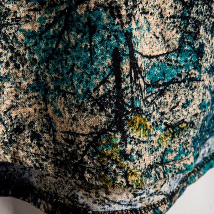 Close-up of Antonios Casual Hawaiian Short-Sleeve Shirt in textured fabric.