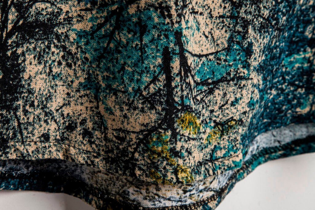 Close-up of Antonios Casual Hawaiian Short-Sleeve Shirt in textured fabric.