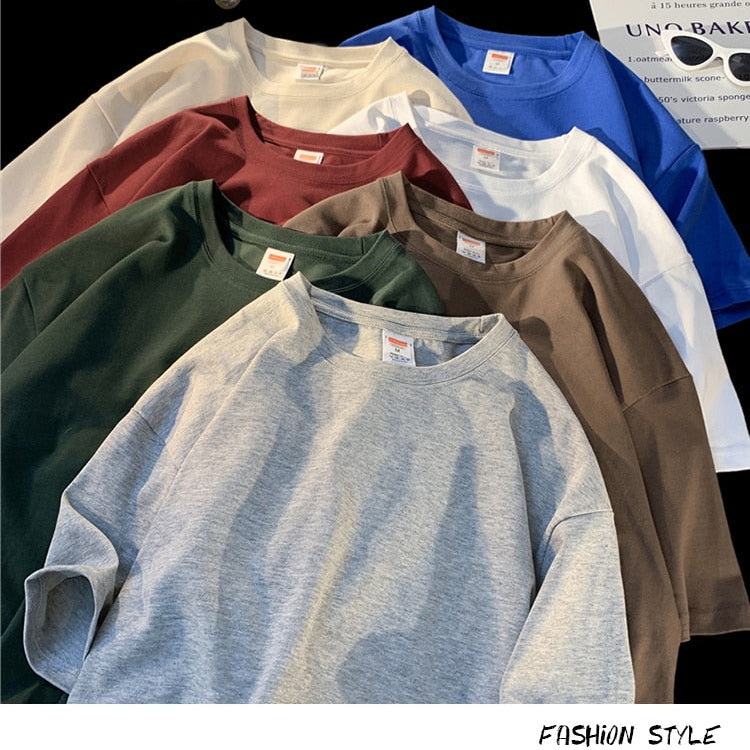 Assorted Antonios Oversized Casual Cotton T-Shirts in various colors displayed.