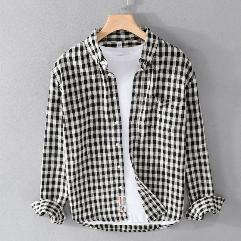 Antonios Casual Plaid Shirt 100% Cotton hanging on hanger, black and white checkered pattern.