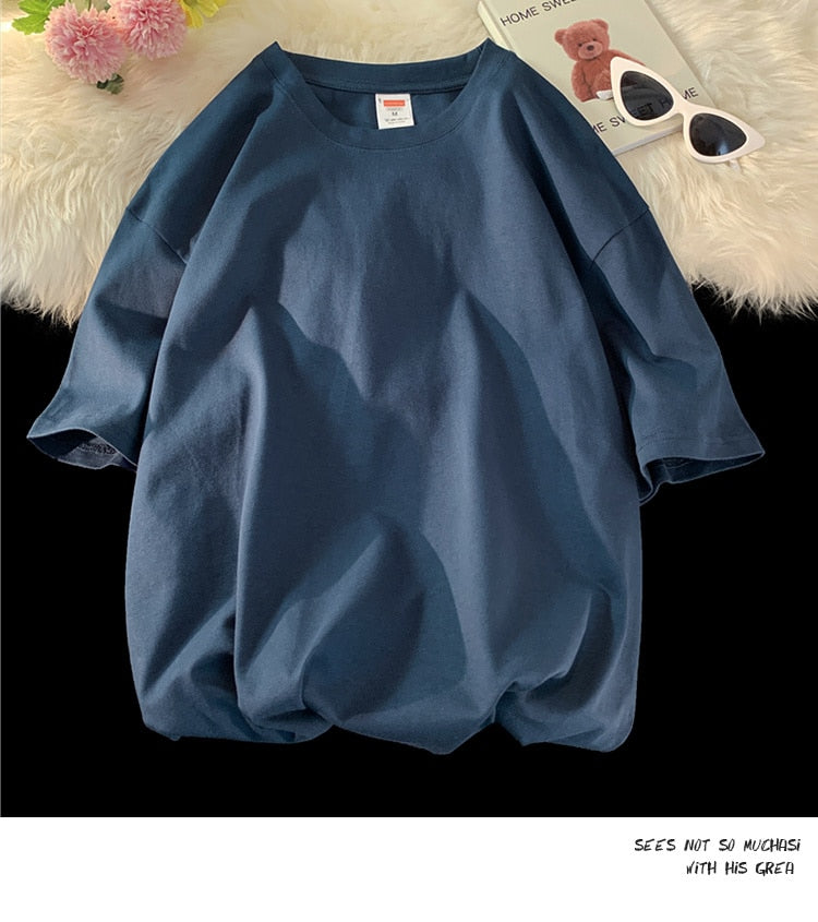 Antonios oversized casual cotton t-shirt in navy blue with short sleeves on display.