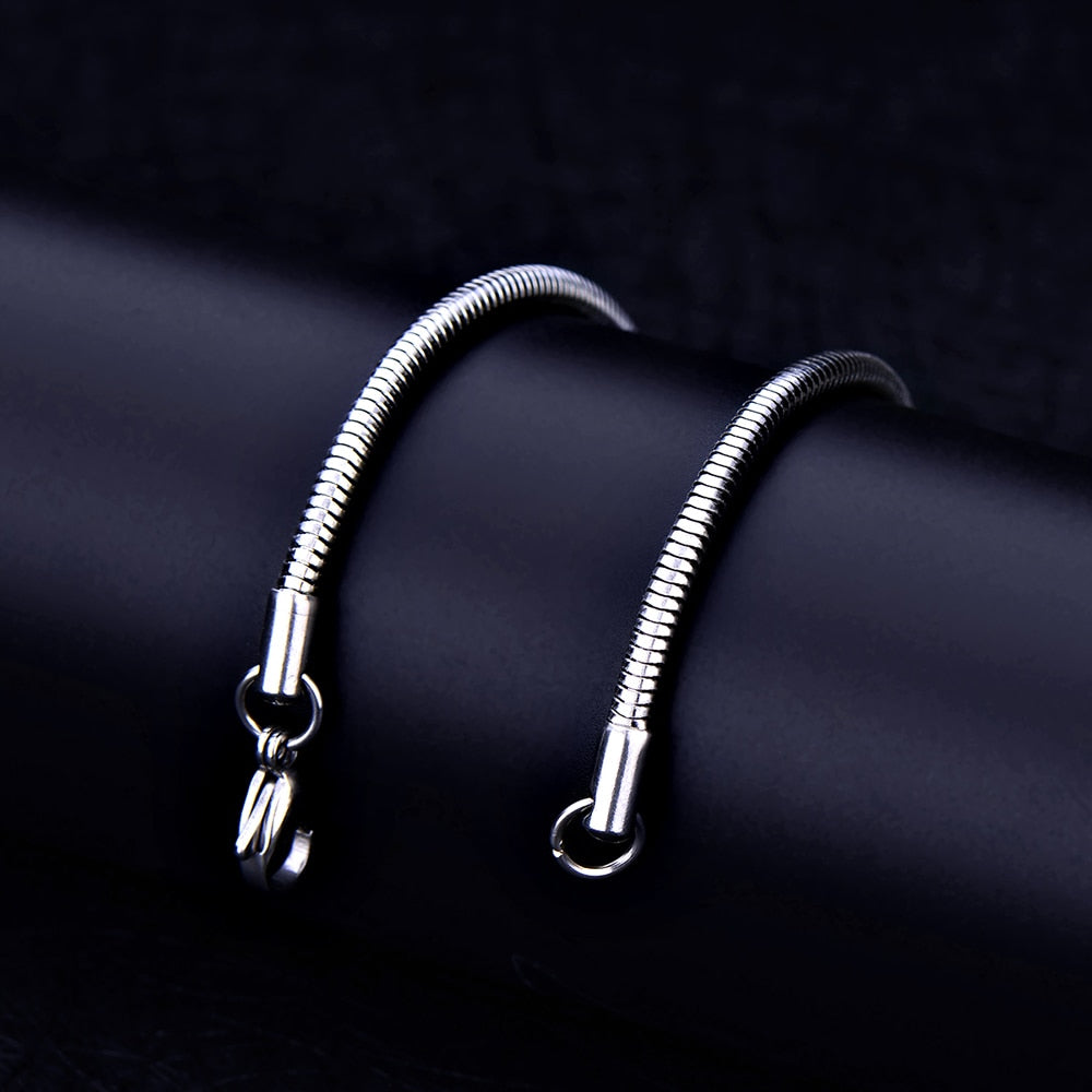 Antonios Snake Stainless Steel Bracelet for men on black background.