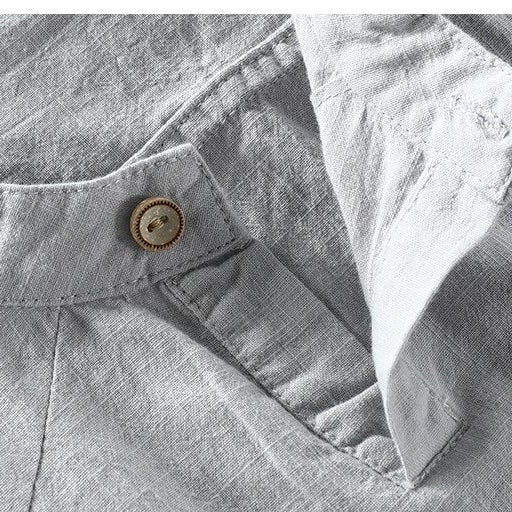 Gray London T-Shirt, close-up of button detail, organic cotton, summer collection.