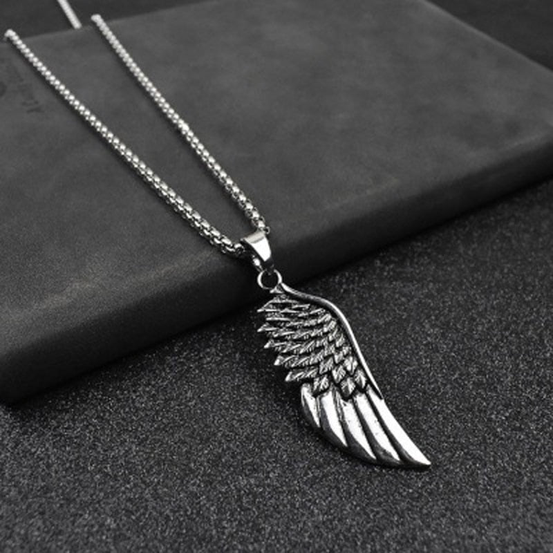 Antonios Vintage Stainless Steel Necklace Men with wing pendant on black background.
