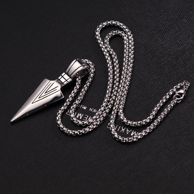 Antonios Vintage Stainless Steel Necklace with arrowhead pendant on dark background.