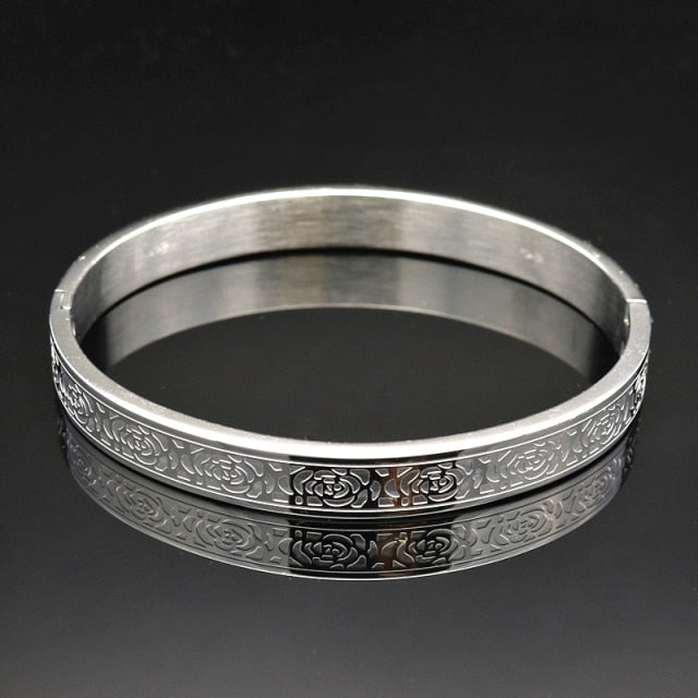 Antonios Flower Bracelet in stainless steel with engraved floral design, luxury men's accessory.