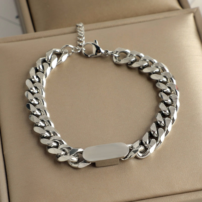 Stainless steel Cuban link bracelet with magnetic clasp for men.