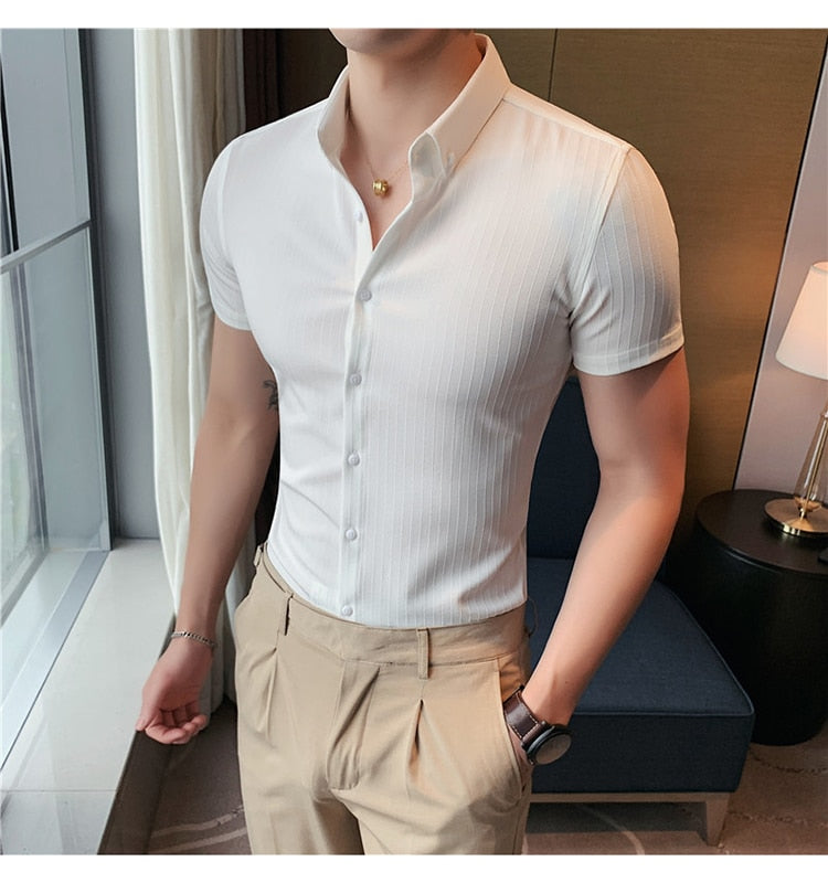 Homme short sleeve shirt in white, designed for formal and casual styles, with a comfortable and breathable fit.