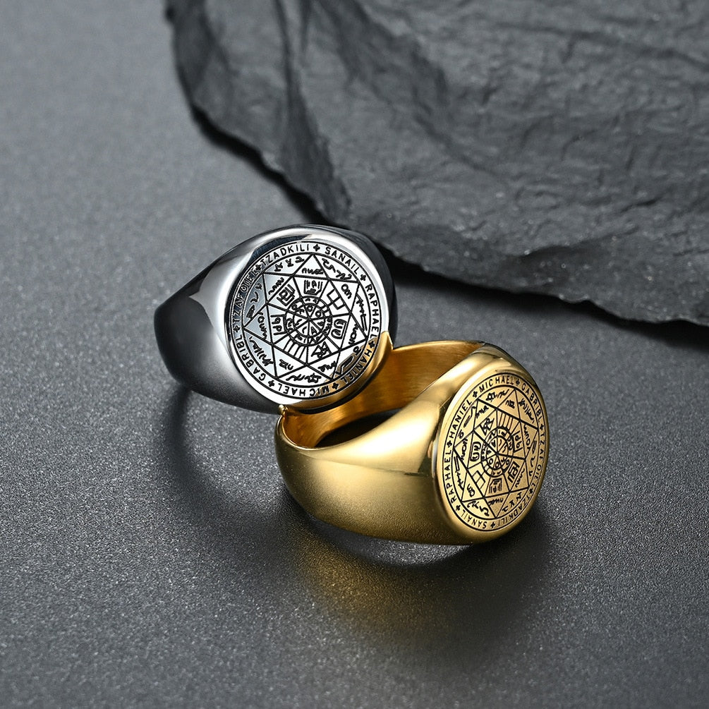 Ancient stainless steel ring with intricate engravings and black diamond centerpiece, available in titanium steel finish.