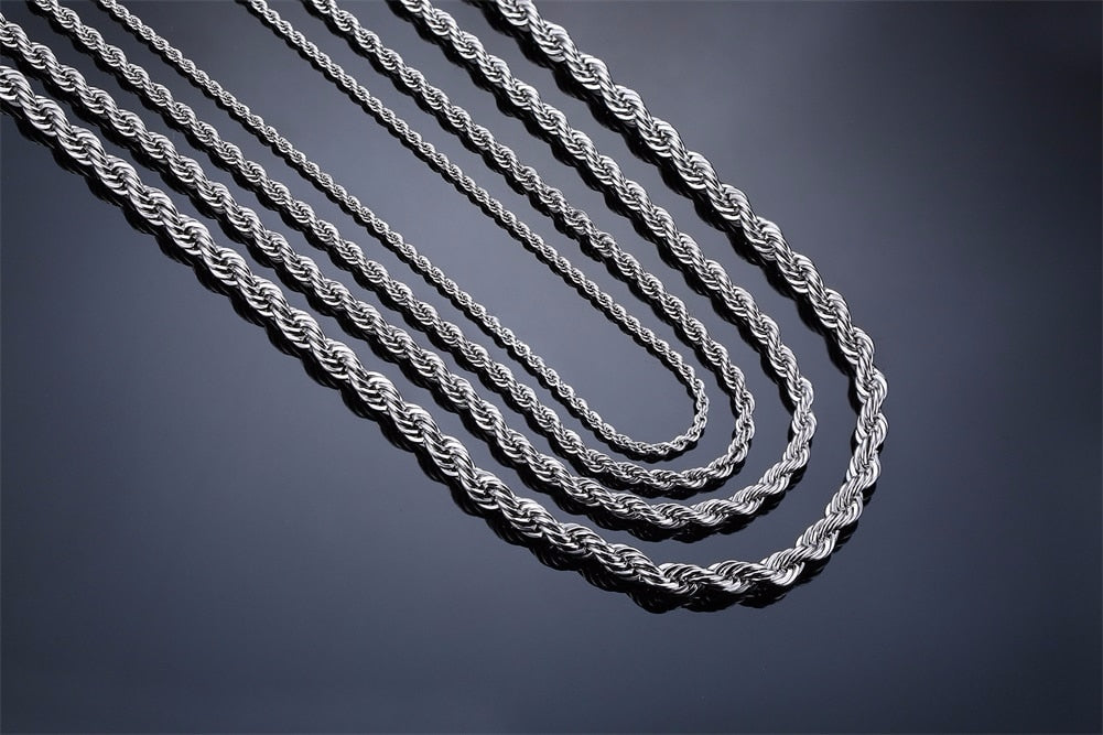 Antonios Twist Stainless Steel Necklace for men displayed in various lengths on a black surface, showcasing its intricate twist design and lustrous finish.
