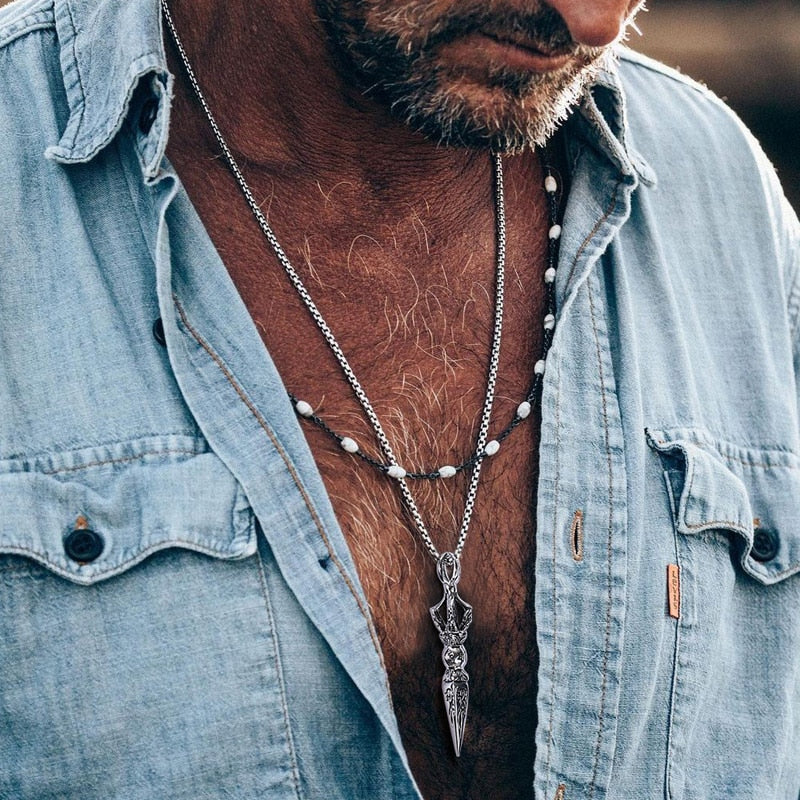 Man wearing Antonios Saint Stainless Steel Necklace, layered style.