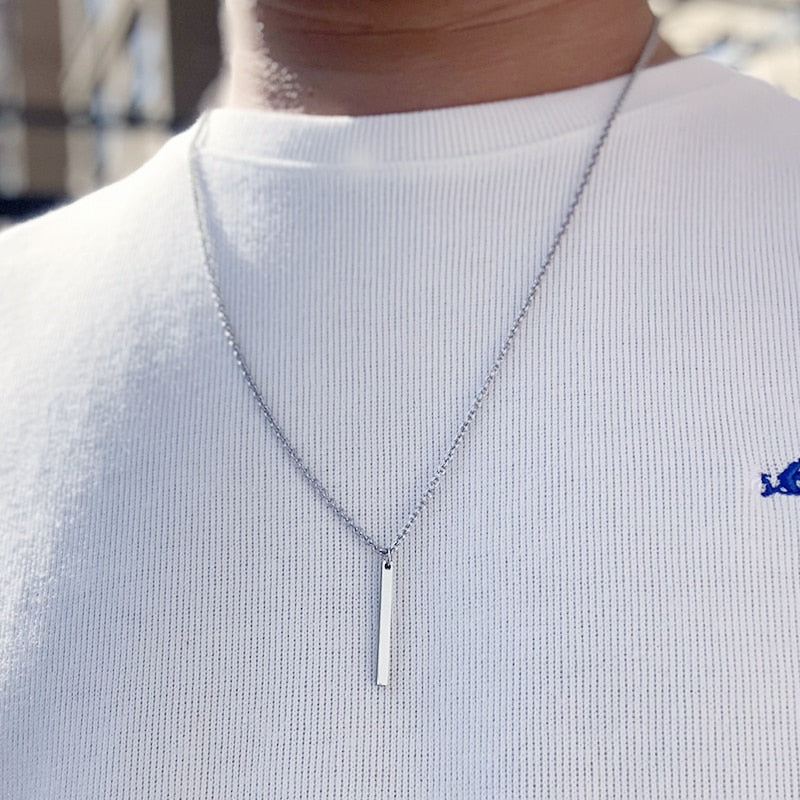 Antonios Minimalist Stainless Steel Necklace Men worn on white shirt.