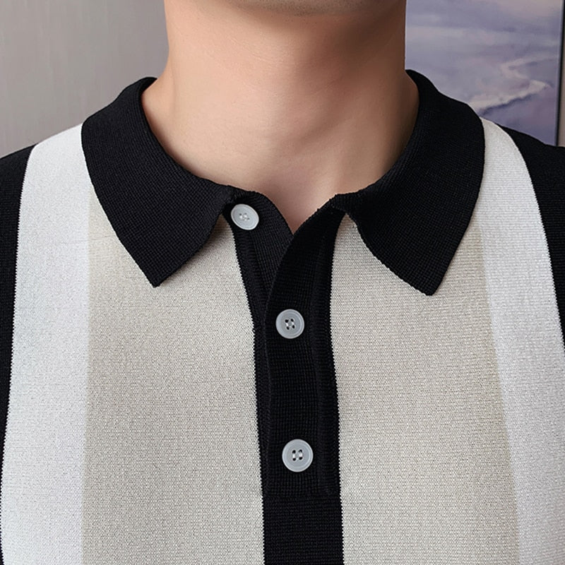 Summer striped polo shirt with black and white stripes, showing a close-up of the collar and buttons, made of organic cotton.
