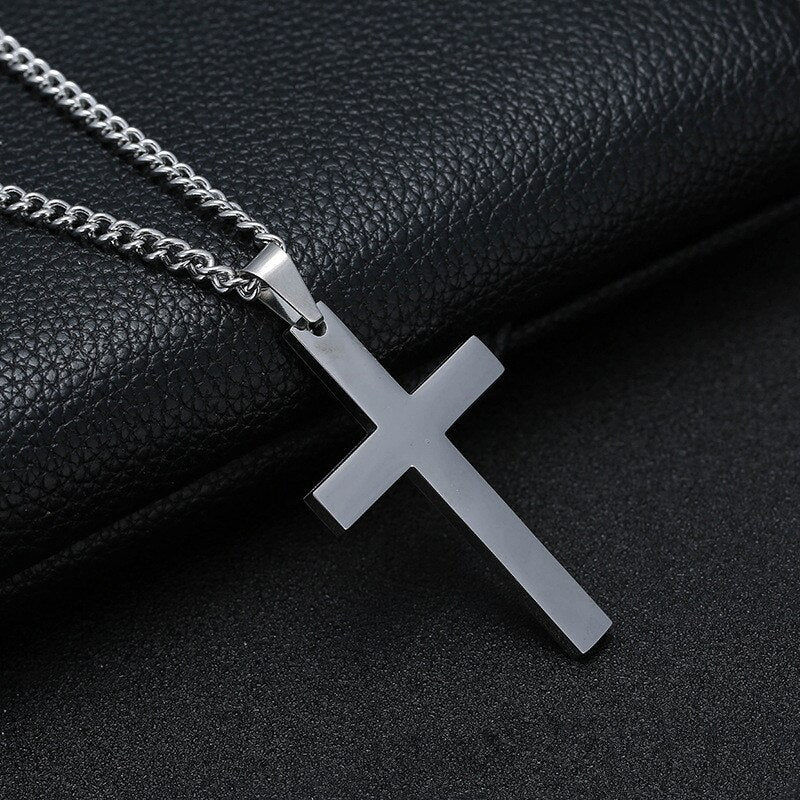 Antonios Cross Stainless Steel Necklace for Men on black leather background.