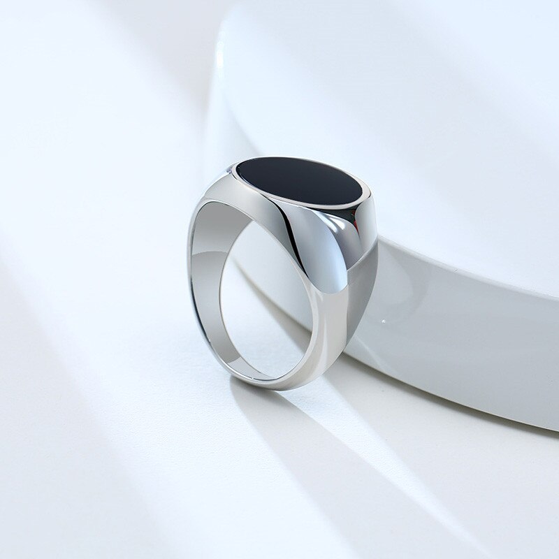 Antonios Modern Stainless Steel Ring Men with gemstone centerpiece and intricate design.