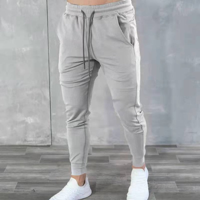 Grey Antonios Streetwear Fitness Joggers for Men, stylish and comfortable, polyester-cotton blend.