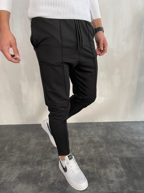 Antonios Streetwear Joggers Men in black, relaxed fit, comfortable polyester and cotton blend.