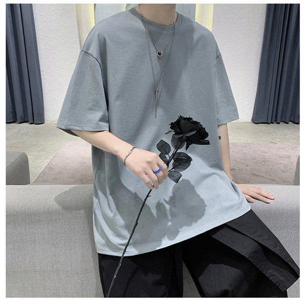 Antonios Pure Cotton T-Shirt styled with black trousers, featuring a relaxed fit and casual accessories.